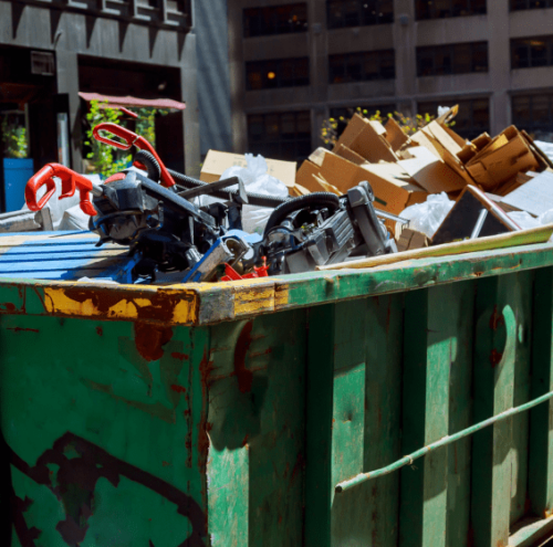 junk removal on a green dumpster services