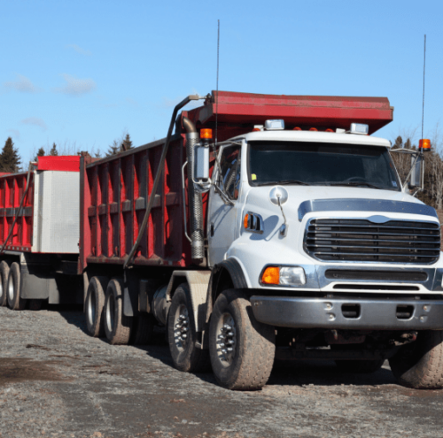 white and red dump trailer services